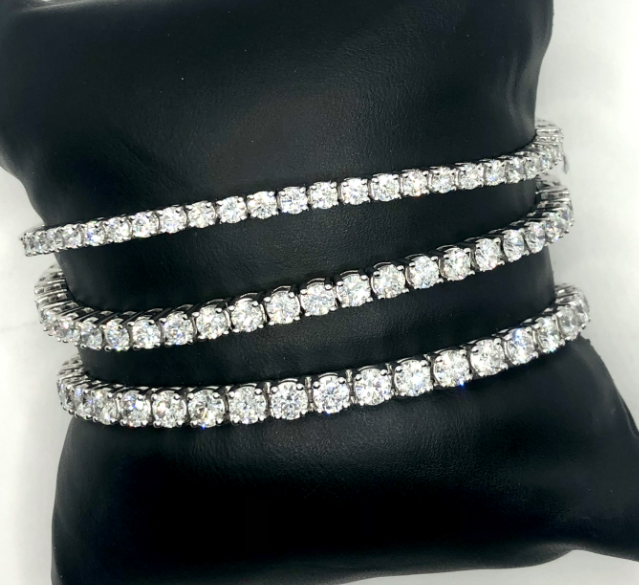 CJL manufactured white or yellow gold diamond Tennis bracelets, 2ct to